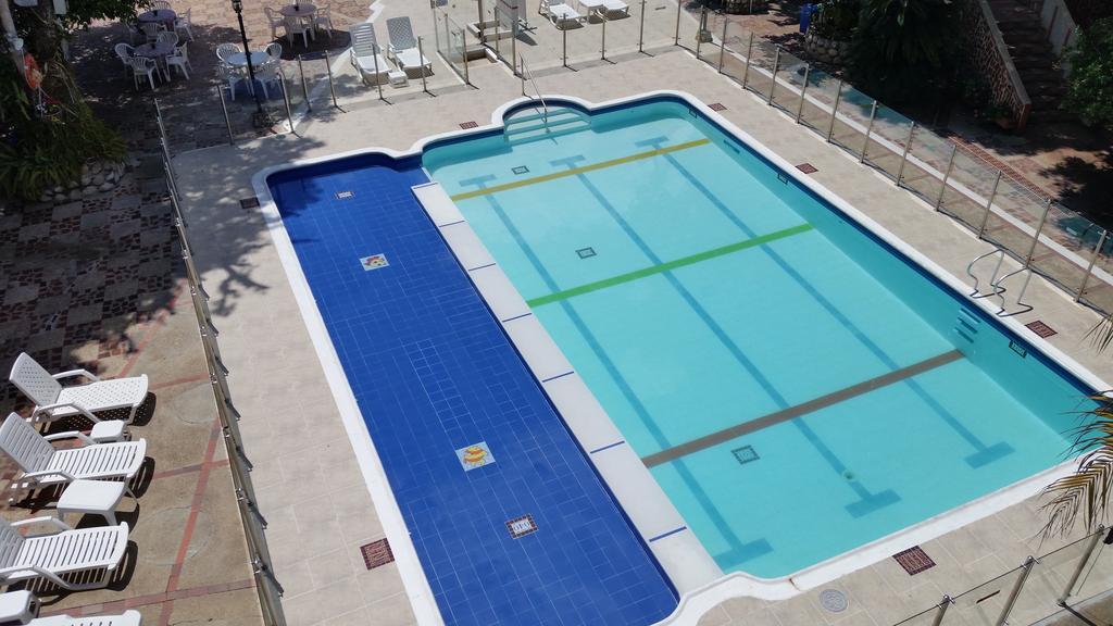 Hotel Villa Maritza Melgar Bagian luar foto